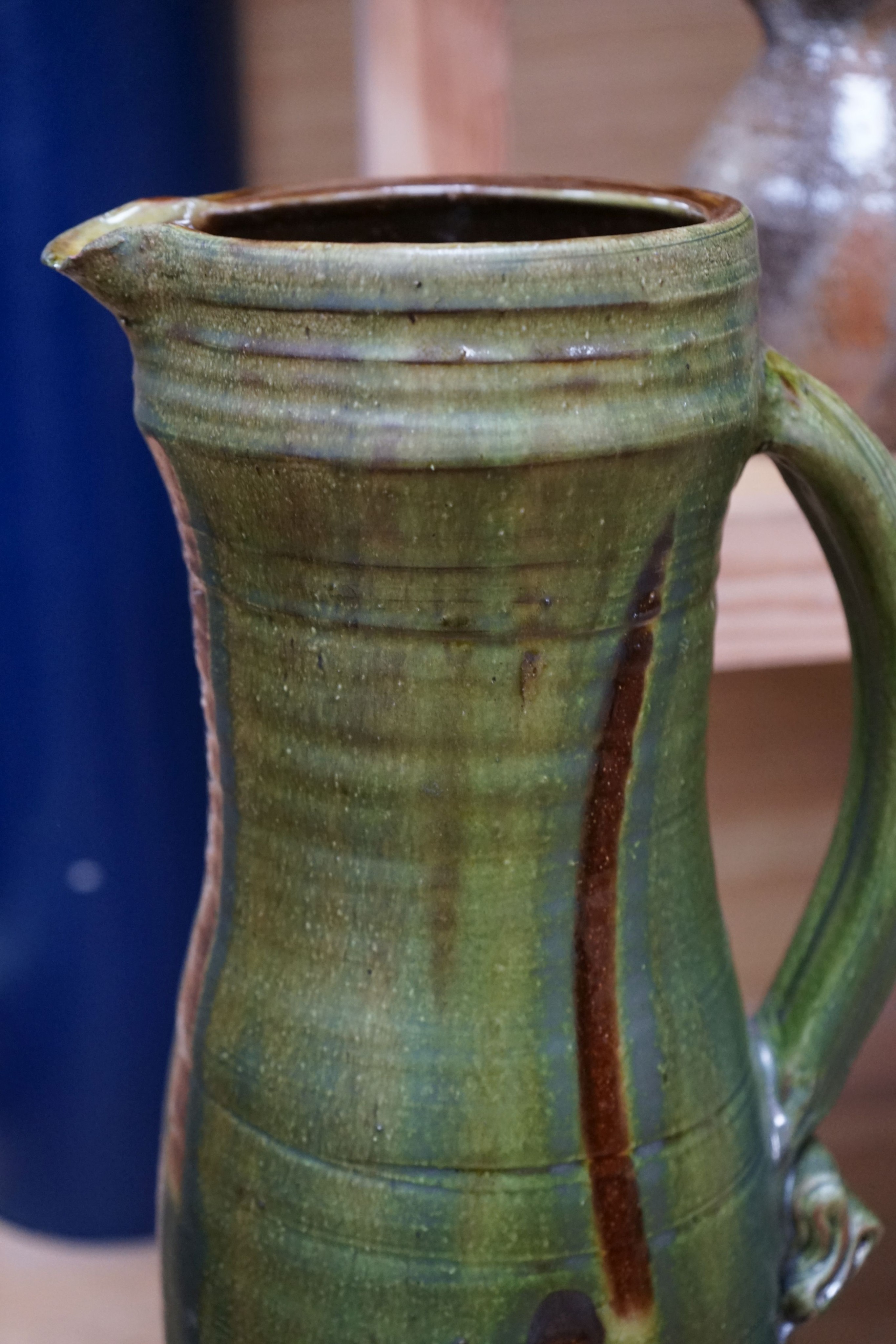 Clive Bowen (b.1943), a tall green glazed and brown slip decorated ewer, 59cm